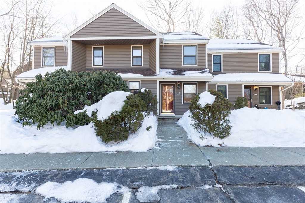 38 Drake Road, Unit 38 Fitchburg, MA 01420 - Photo 1 of 31 a front view of a house with a yard