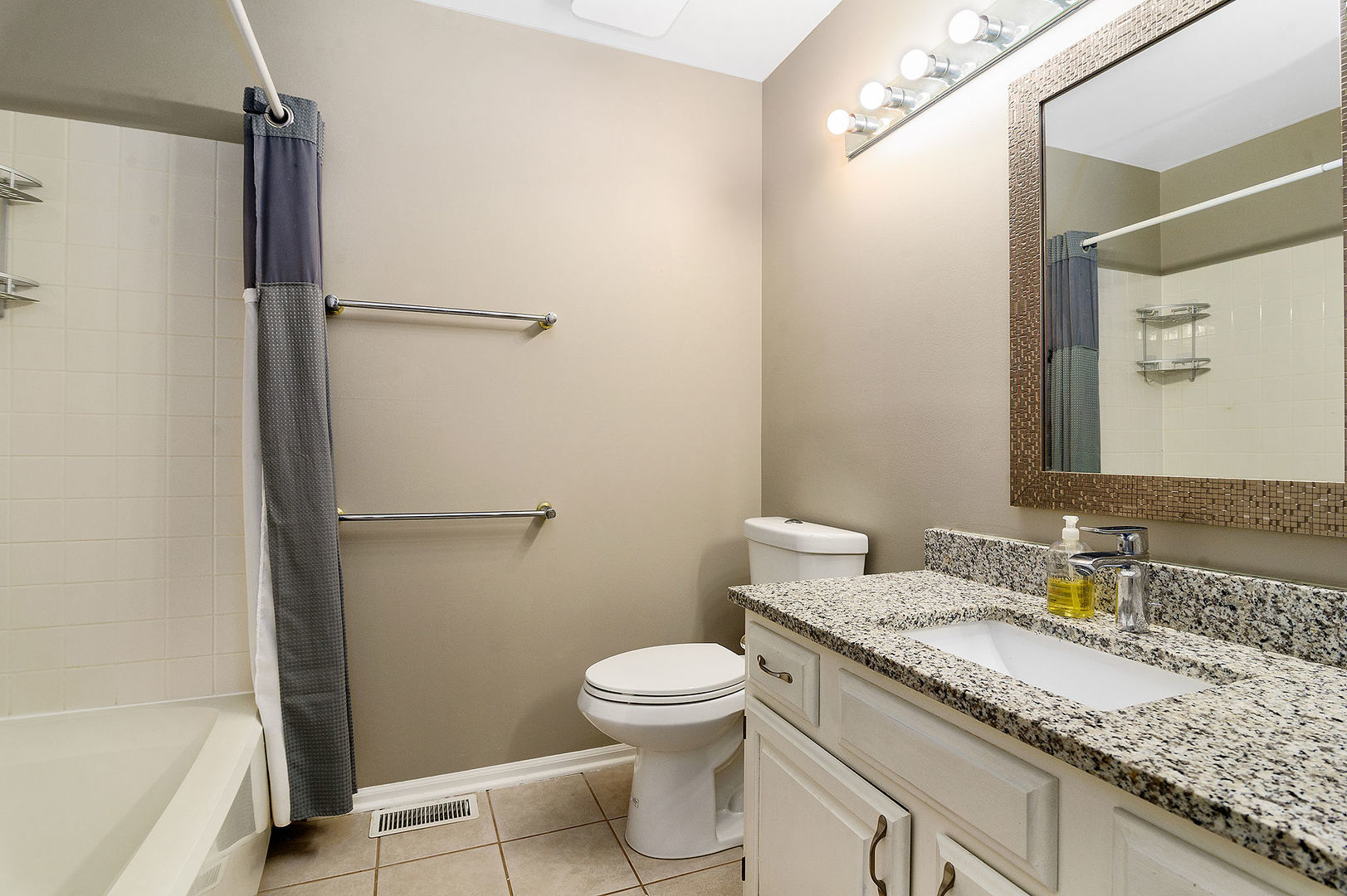 1516 Diamond Drive Hoffman Estates, IL 60192 - Photo 16 of 20 a bathroom with a granite countertop sink toilet and shower