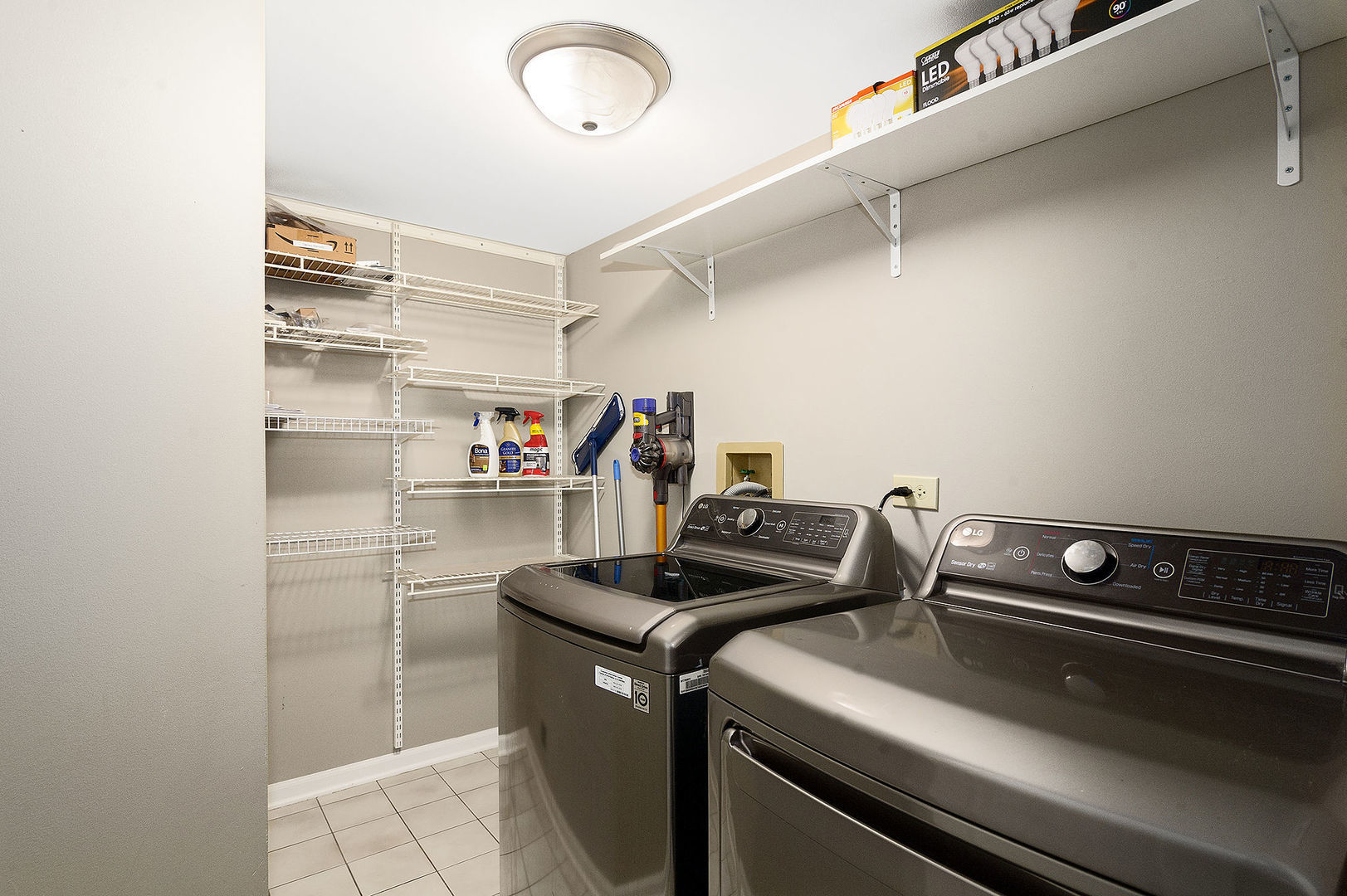 1516 Diamond Drive Hoffman Estates, IL 60192 - Photo 9 of 20 a room with storage and utility