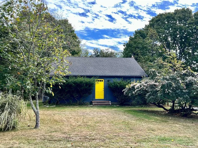 a house view with a garden space