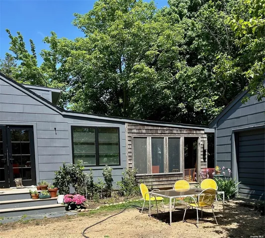 a front view of a house with patio