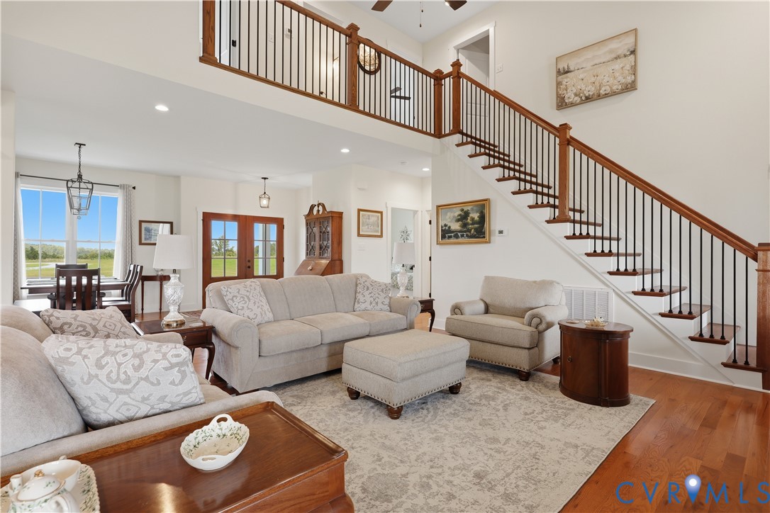 25181 West Soap Stone Road Jetersville, VA 23083 - Photo 10 of 54 Spacious living area featuring wood-finish floorin