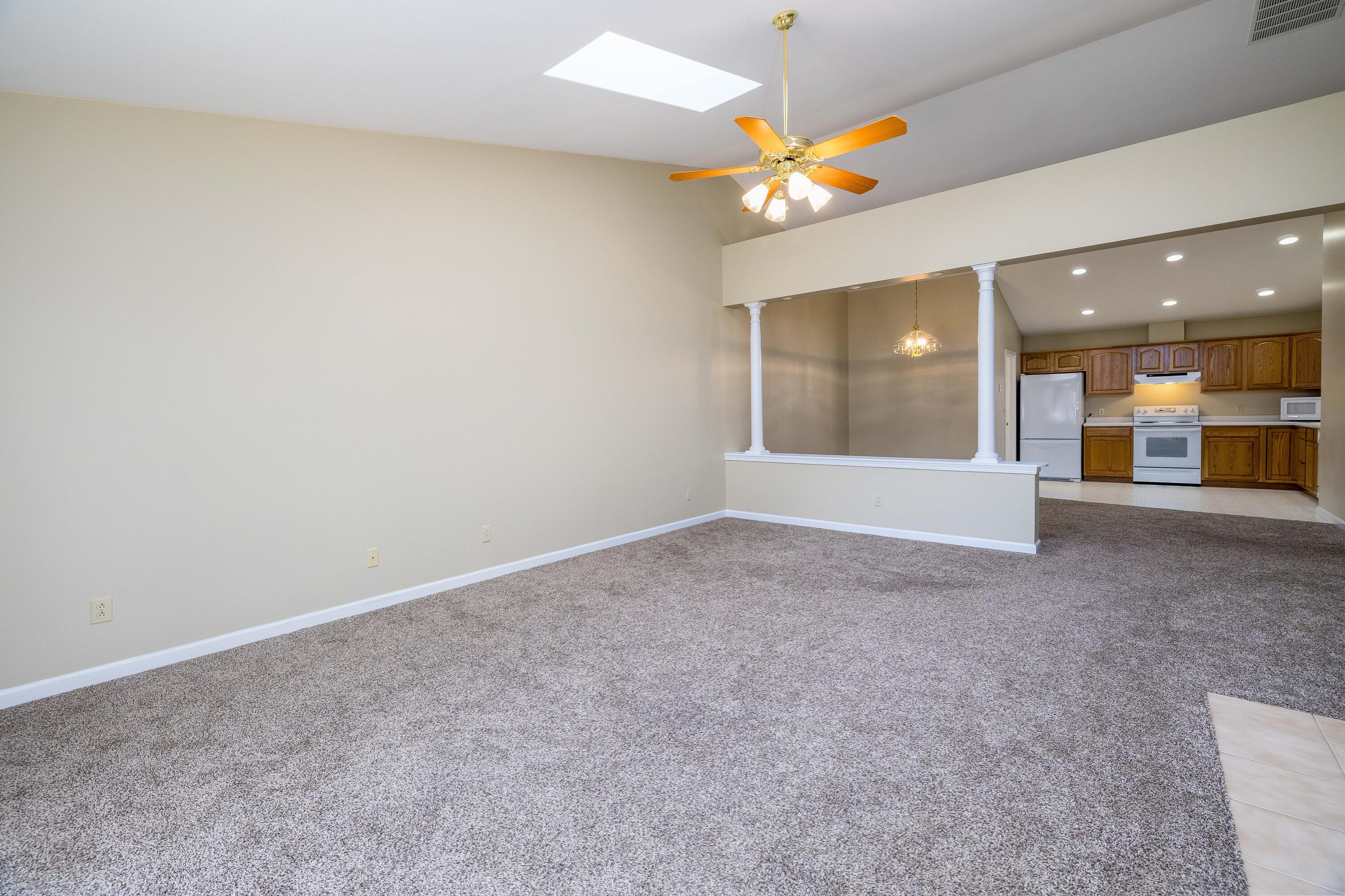 431 Pheasant Run Rensselaer, IN 47978 - Photo 11 of 31 a view of a hallway with a chandelier
