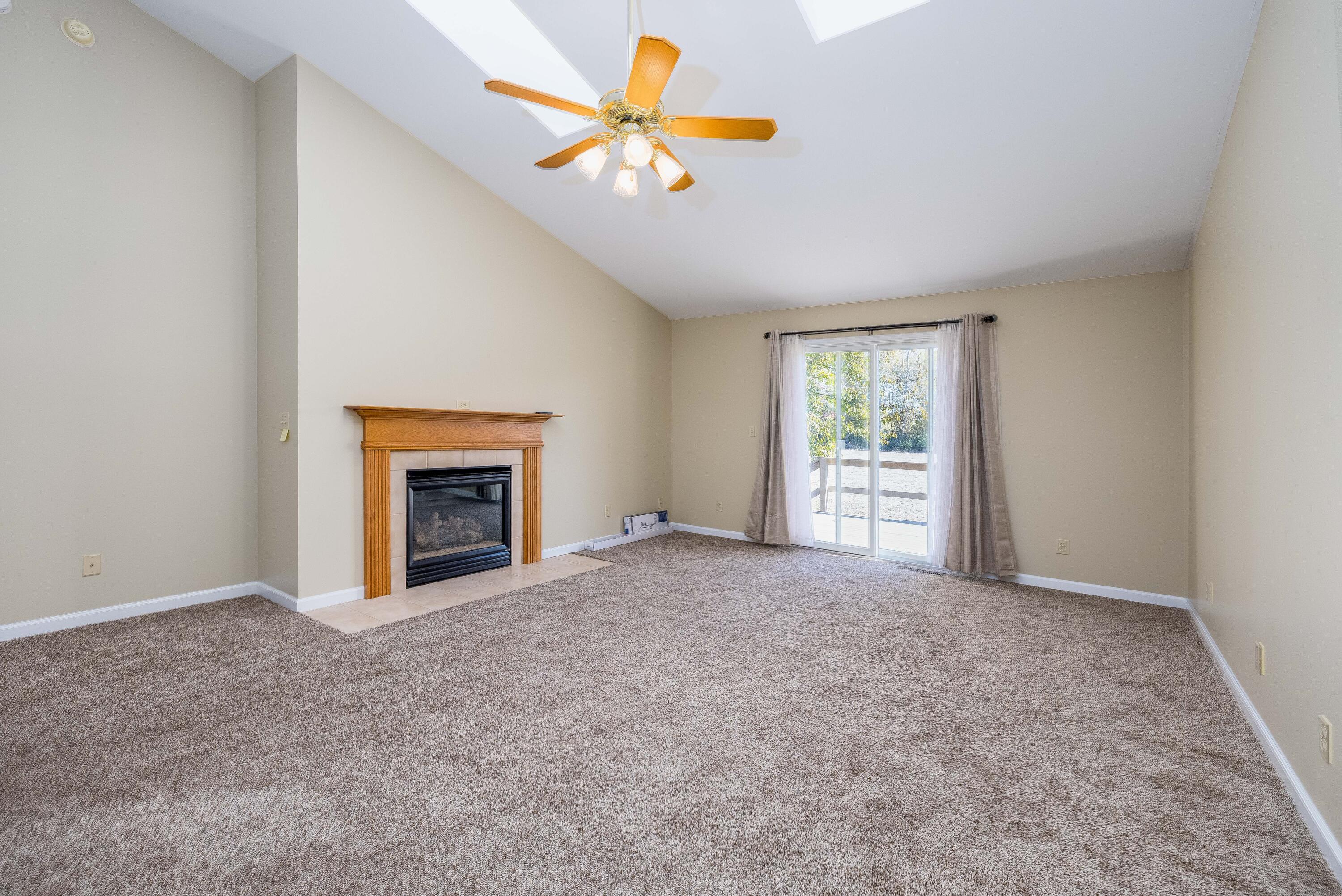 431 Pheasant Run Rensselaer, IN 47978 - Photo 13 of 31 an empty room with windows and chandelier fan
