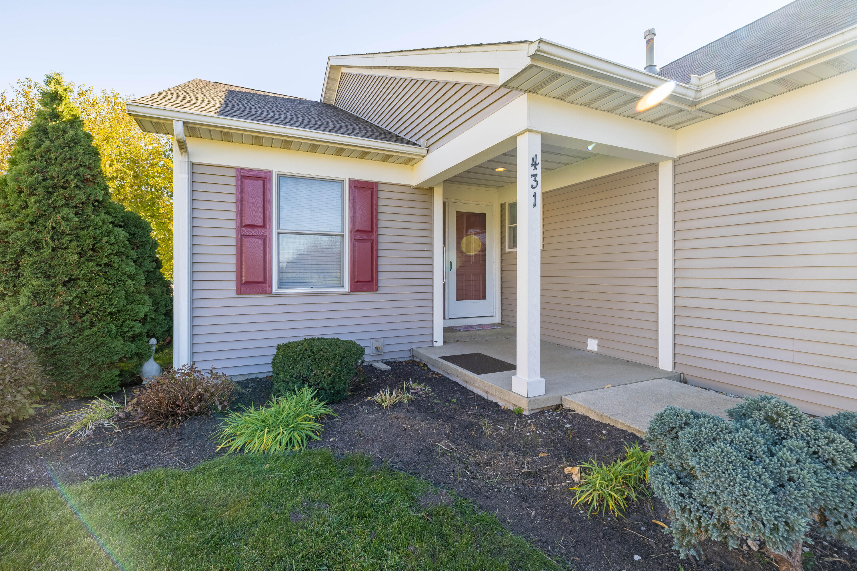 431 Pheasant Run Rensselaer, IN 47978 - Photo 2 of 31 a front view of a house with garden