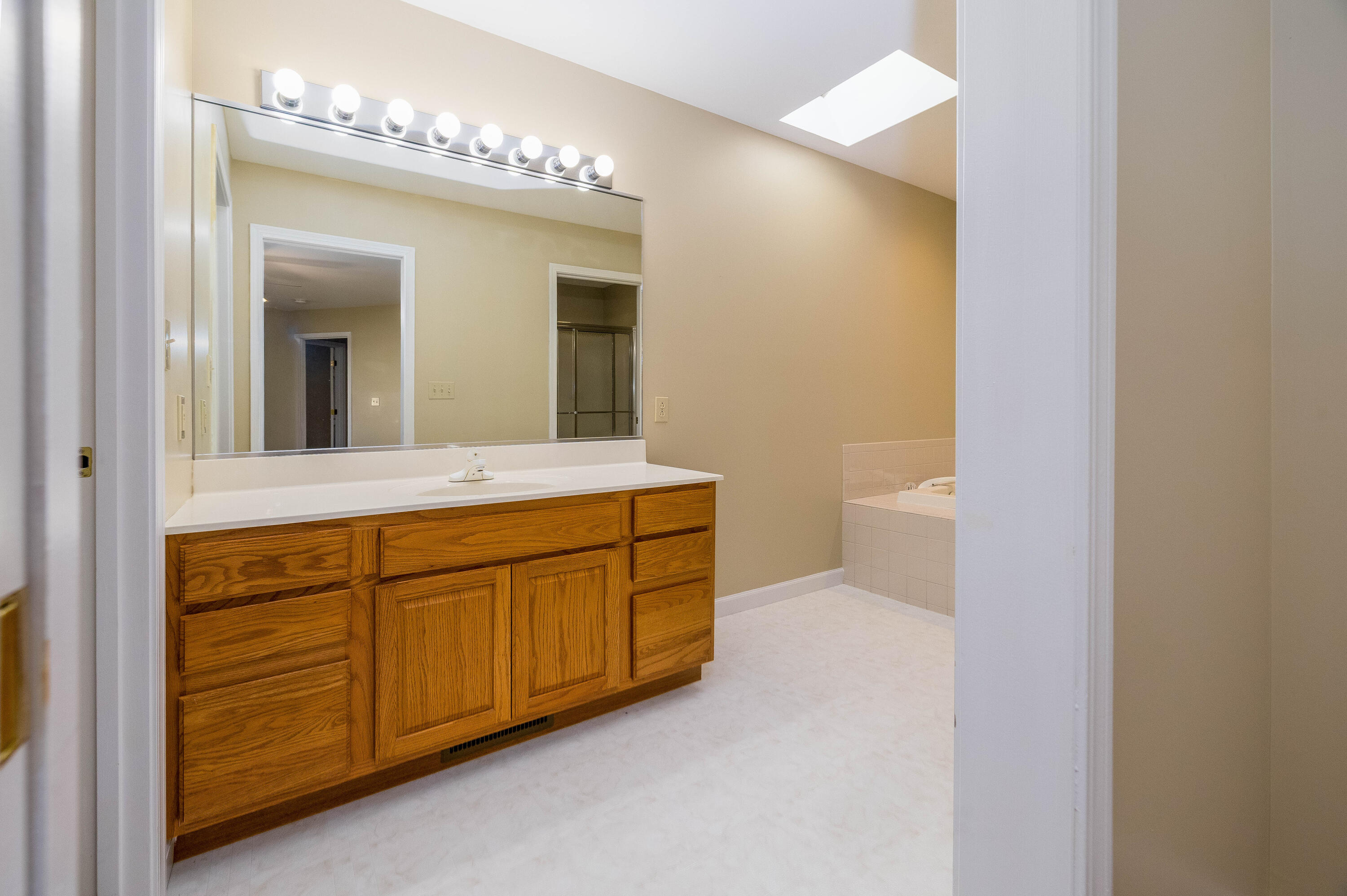 431 Pheasant Run Rensselaer, IN 47978 - Photo 24 of 31 a bathroom with a sink and a mirror