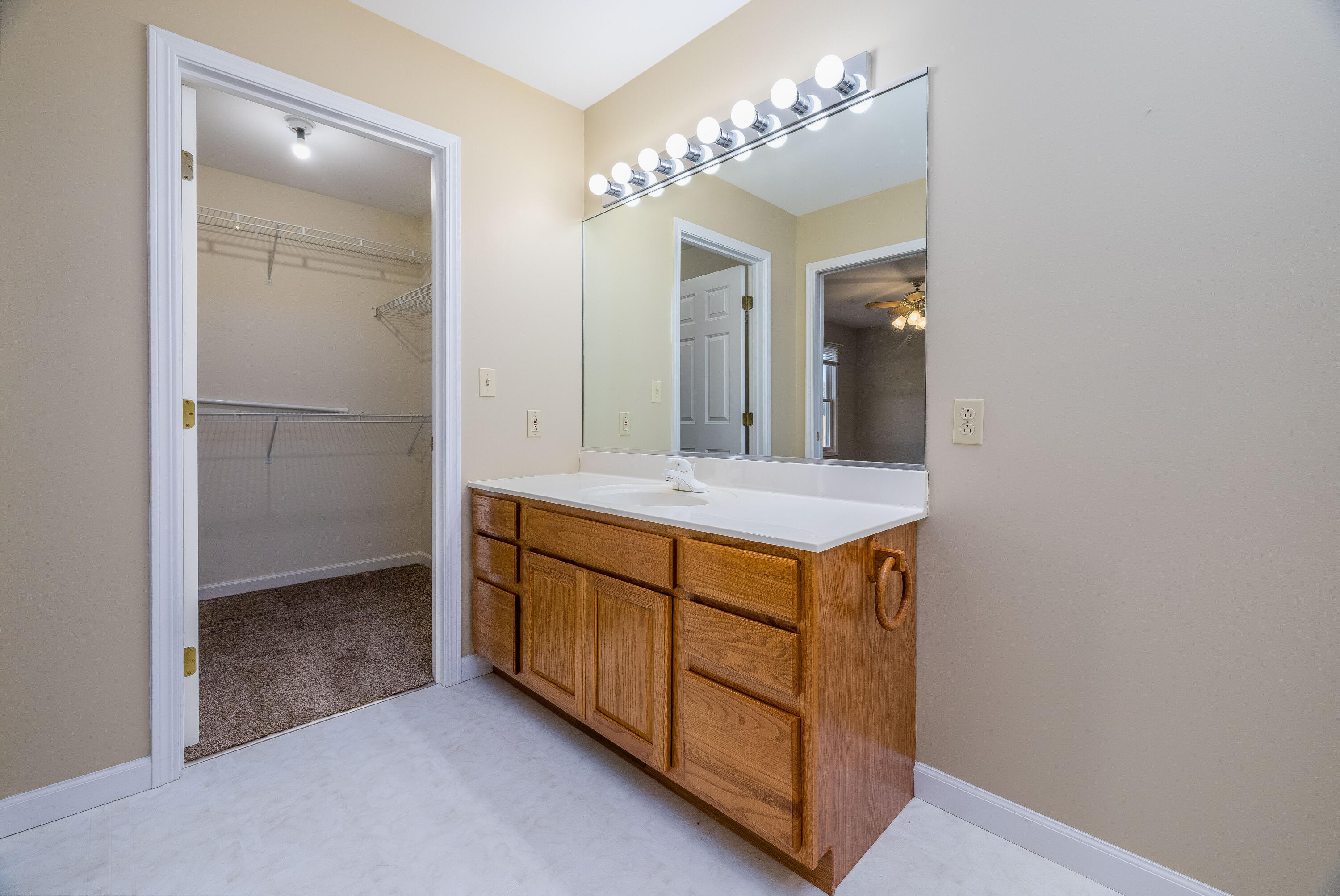 431 Pheasant Run Rensselaer, IN 47978 - Photo 25 of 31 a bathroom with a double vanity sink and a mirror