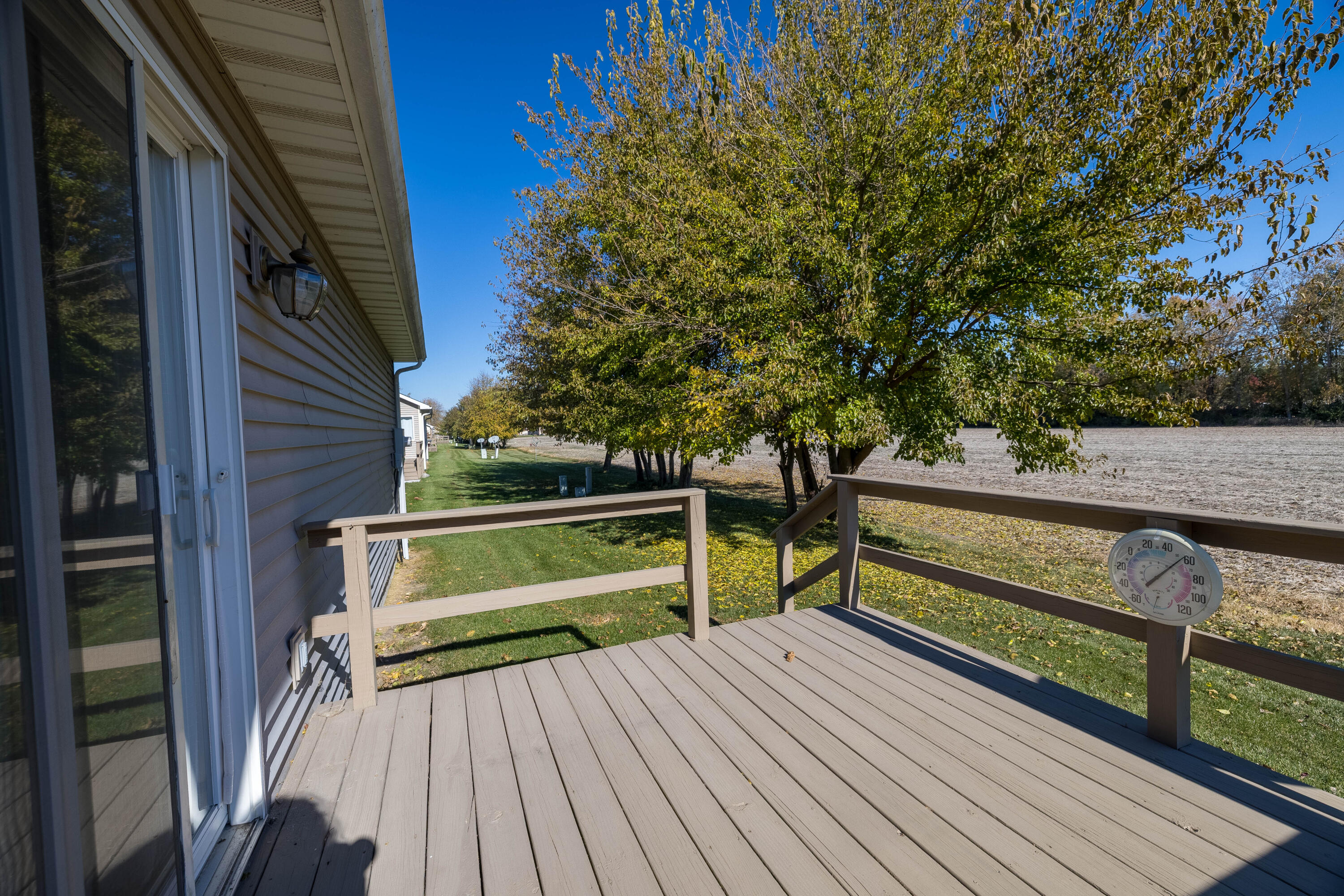 431 Pheasant Run Rensselaer, IN 47978 - Photo 7 of 31 a view of sitting area on wooden deck