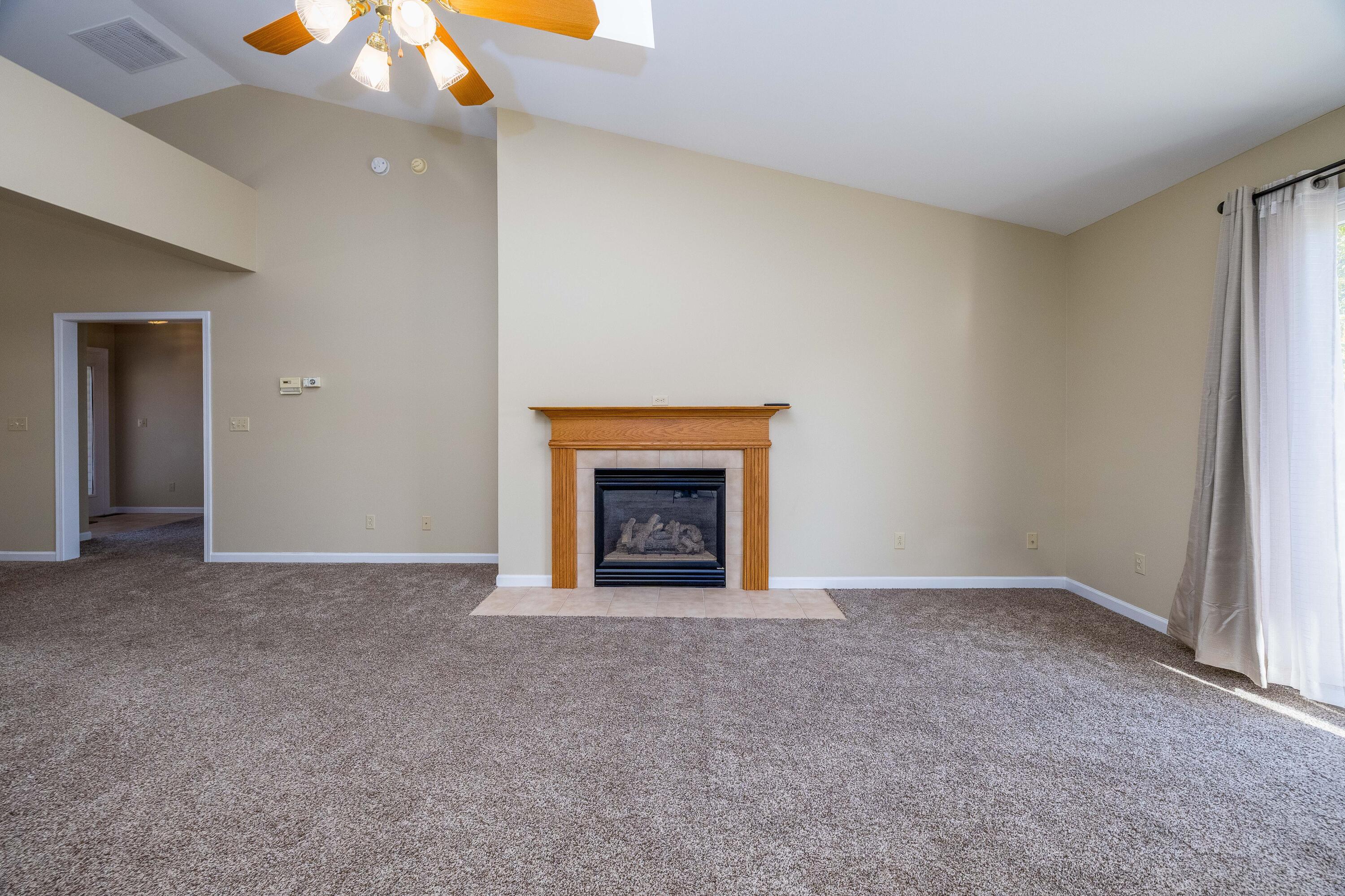 431 Pheasant Run Rensselaer, IN 47978 - Photo 10 of 31 a view of an empty room with a fireplace