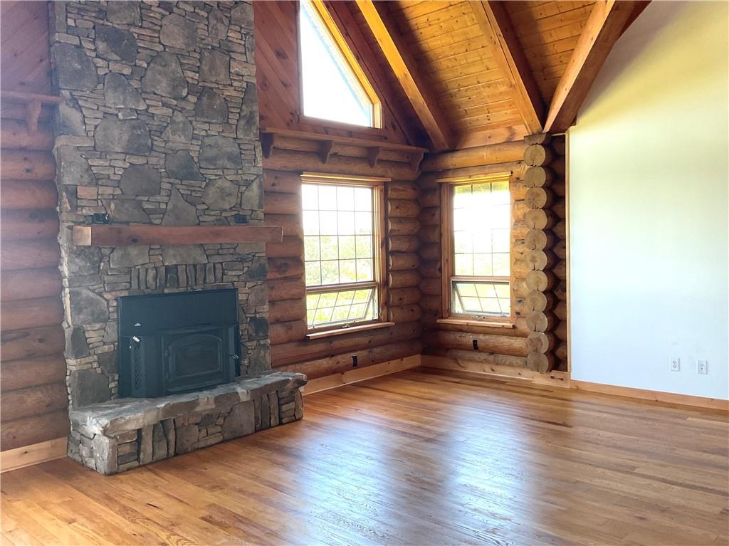 140 Hauger Road Rockwood, PA 15557 - Photo 23 of 50 a view of an empty room with exposed radiator and fireplace