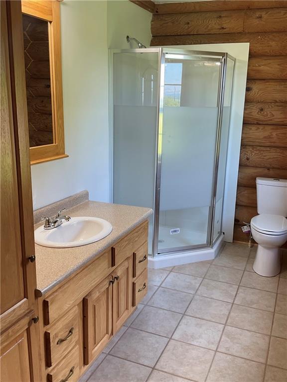 140 Hauger Road Rockwood, PA 15557 - Photo 27 of 50 a bathroom with a sink a toilet and shower