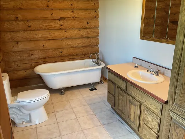 a view of front door with wooden floor