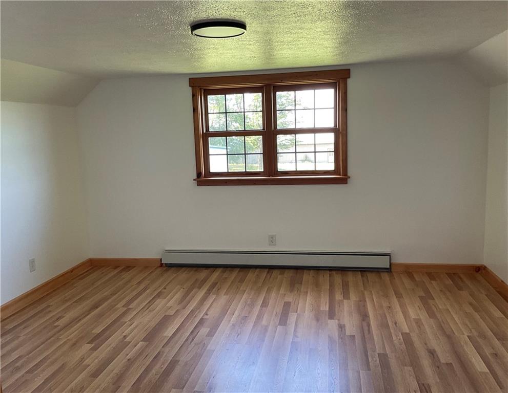 140 Hauger Road Rockwood, PA 15557 - Photo 35 of 50 an empty room with wooden floor and windows