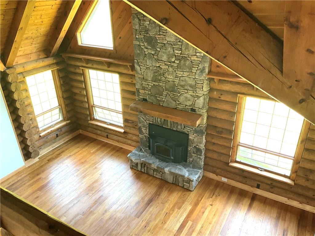 140 Hauger Road Rockwood, PA 15557 - Photo 40 of 50 a view of an empty room with wooden floor and a window