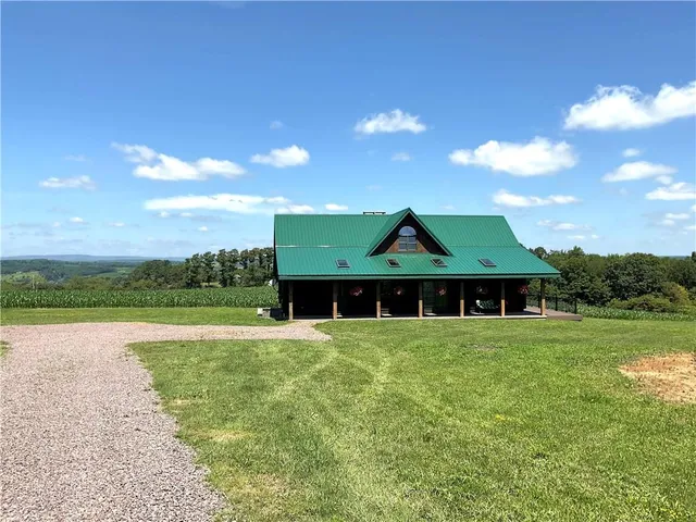 a view of a house with a big yard