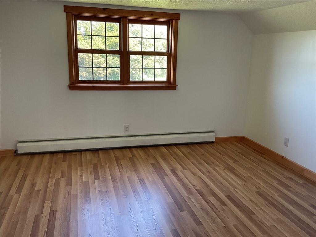 140 Hauger Road Rockwood, PA 15557 - Photo 41 of 50 an empty room with wooden floor and windows