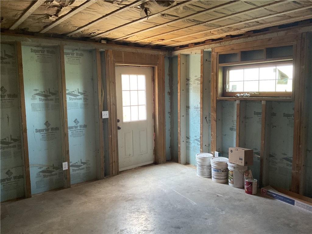 140 Hauger Road Rockwood, PA 15557 - Photo 48 of 50 a view of an empty room with a birdcage and a window