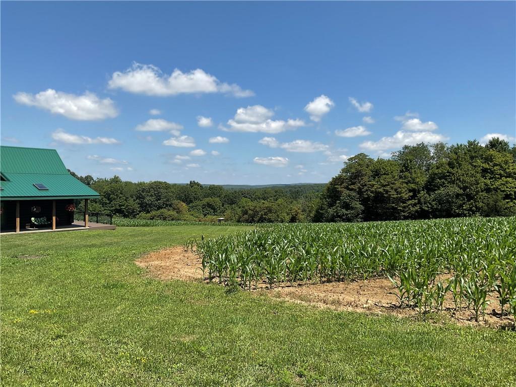 140 Hauger Road Rockwood, PA 15557 - Photo 5 of 50 a view of a lake with a house in the background