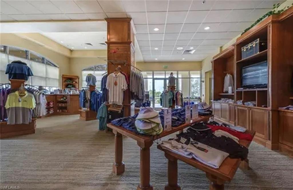 7859 Hawthorne Terrace, Unit 1504 Naples, FL 34113 - Photo 42 of 43 a living room with furniture and wooden floor
