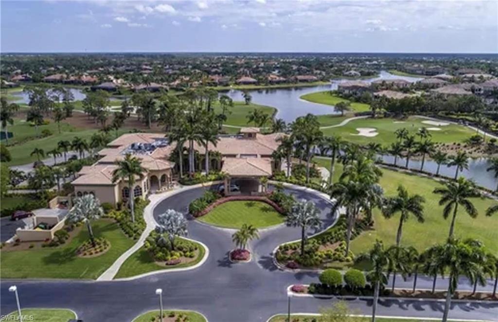 7859 Hawthorne Terrace, Unit 1504 Naples, FL 34113 - Photo 43 of 43 an aerial view of a swimming pool and outdoor space
