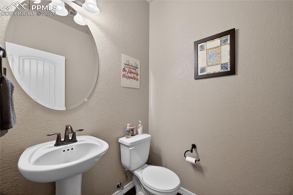13138 Diamond Edge Way Colorado Springs, CO 80921 - Photo 5 of 32 main level powder bath