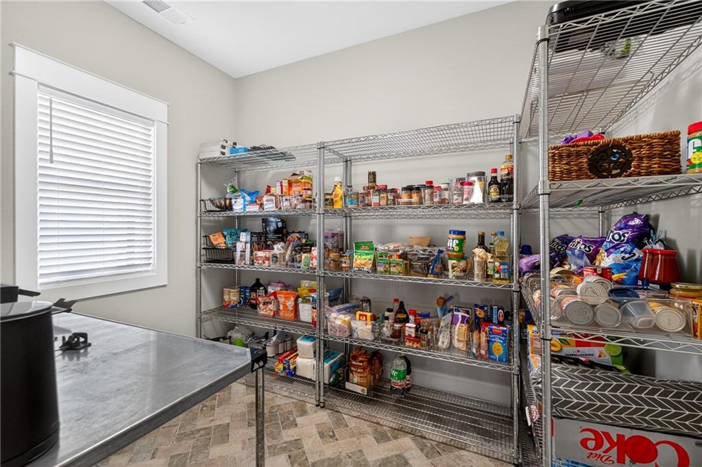 353 Newt Green Road Ball Ground, GA 30107 - Photo 23 of 52 a store room with lots of fruit and vegetables