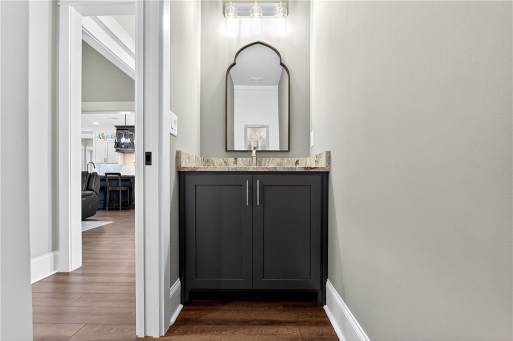 353 Newt Green Road Ball Ground, GA 30107 - Photo 32 of 52 a view of living room with a sink