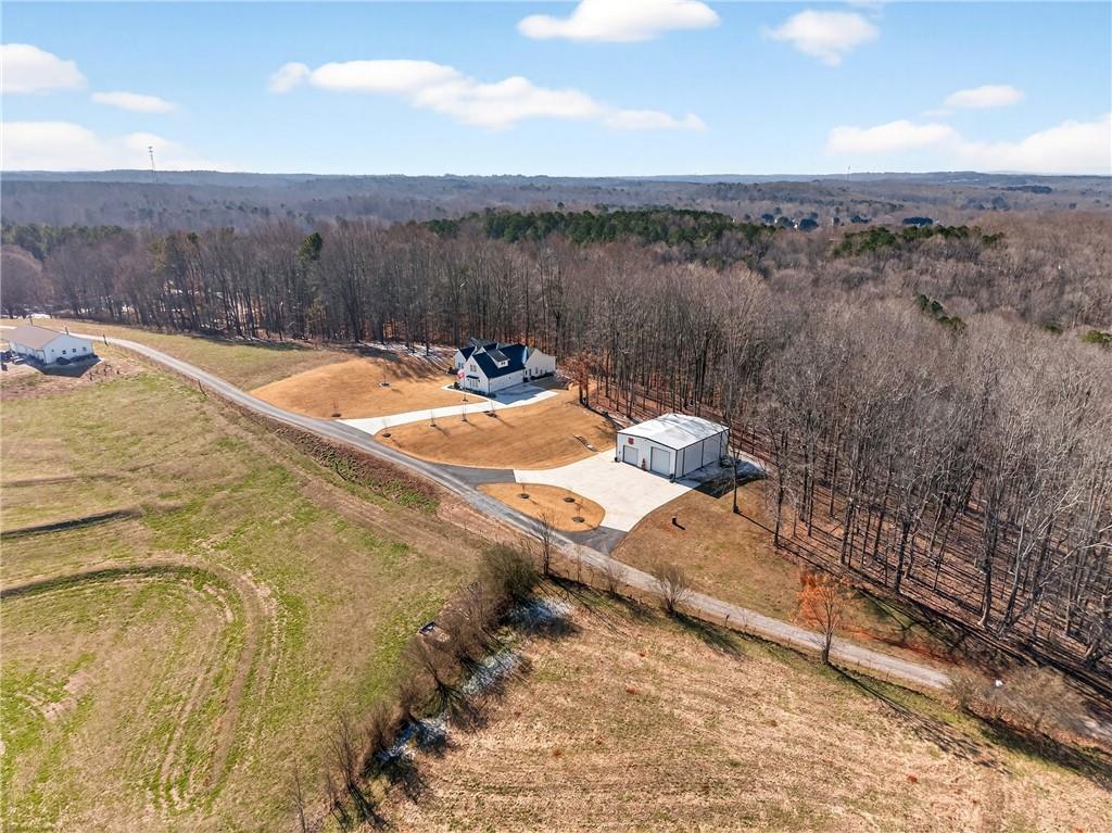 353 Newt Green Road Ball Ground, GA 30107 - Photo 4 of 52 a view of a yard