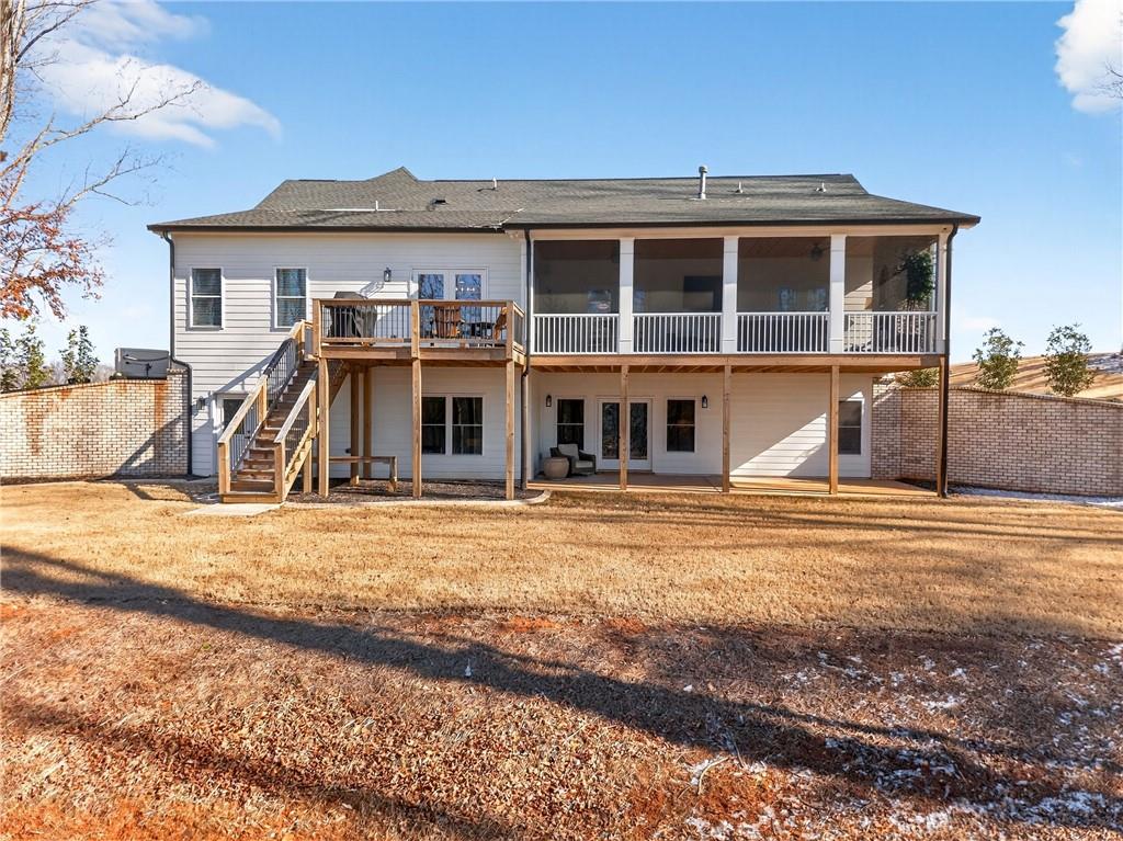 353 Newt Green Road Ball Ground, GA 30107 - Photo 42 of 52 a front view of a house with a yard