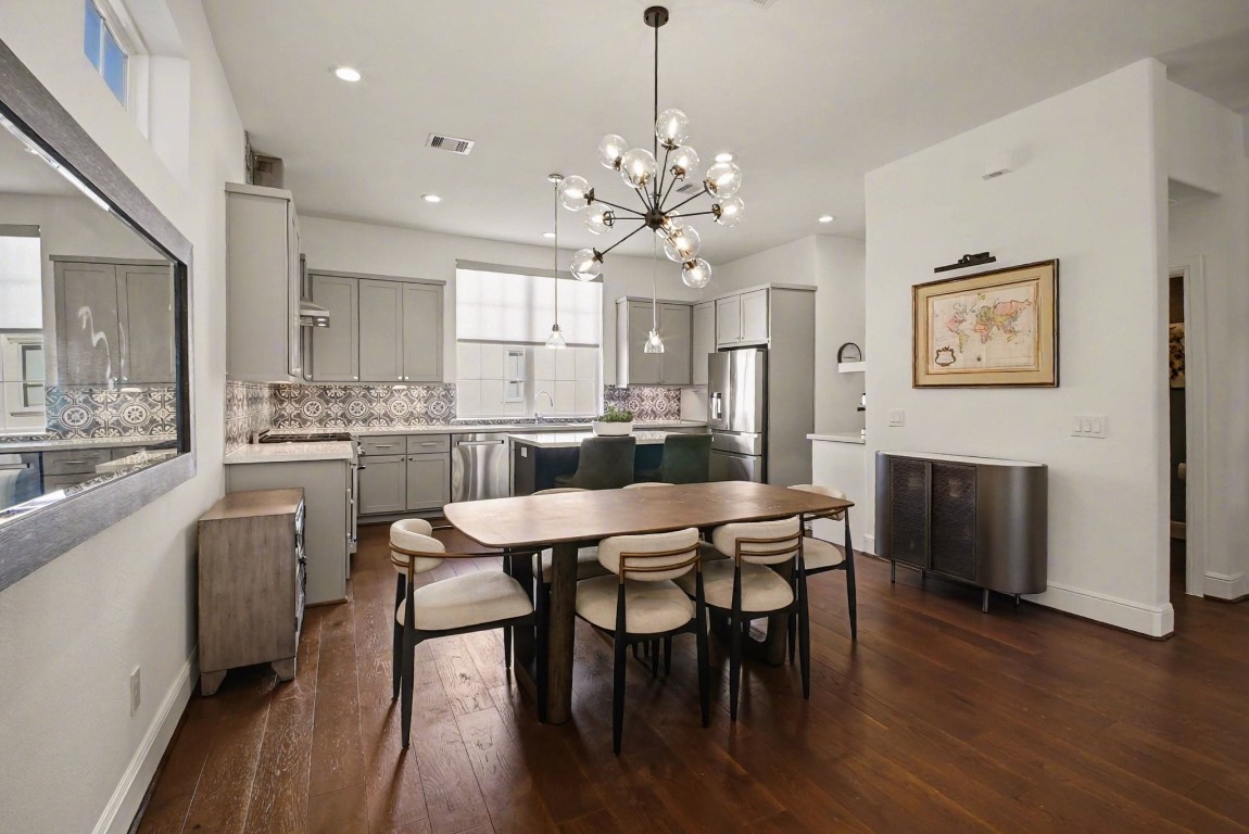 3507 Ridgeway Valley Lane Houston, TX 77055 - Photo 12 of 50 Enjoy the glamorour contemporary dining room chandelier.