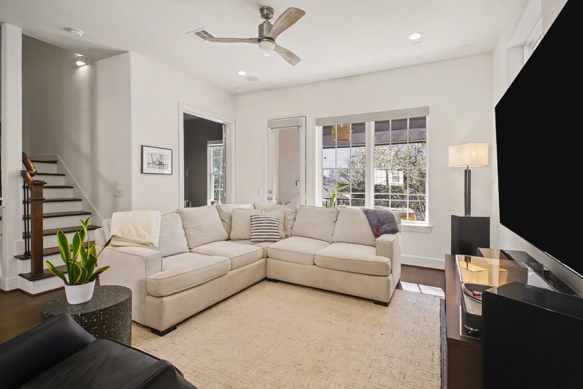 3507 Ridgeway Valley Lane Houston, TX 77055 - Photo 9 of 50 The living room boasts wonderful natural light. There are also can lights plus and upgraded contemporary ceiling fan!