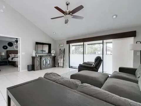 a living room with furniture and a rug