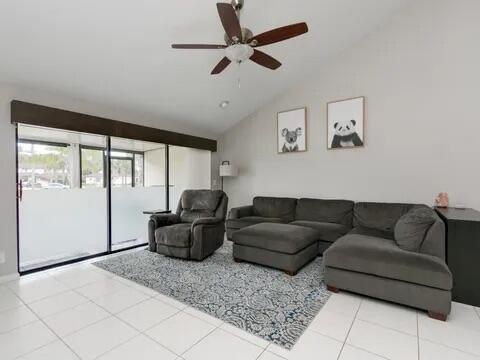 20851 Boca Ridge Drive North Boca Raton, FL 33428 - Photo 18 of 36 a living room with furniture and a large window
