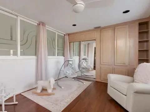 a living room with wooden floor