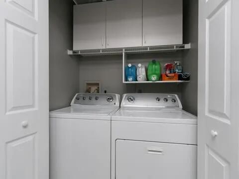 20851 Boca Ridge Drive North Boca Raton, FL 33428 - Photo 33 of 36 a utility room with dryer and washer