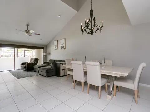 20851 Boca Ridge Drive North Boca Raton, FL 33428 - Photo 7 of 36 a view of a dining room with furniture