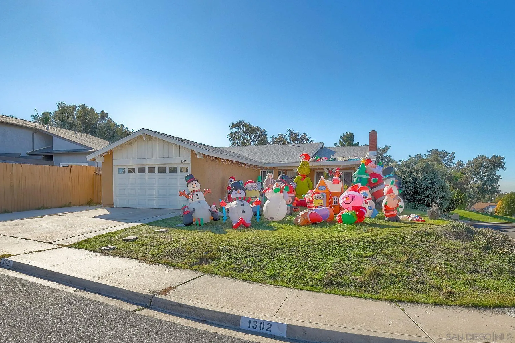 a view of front door with yard