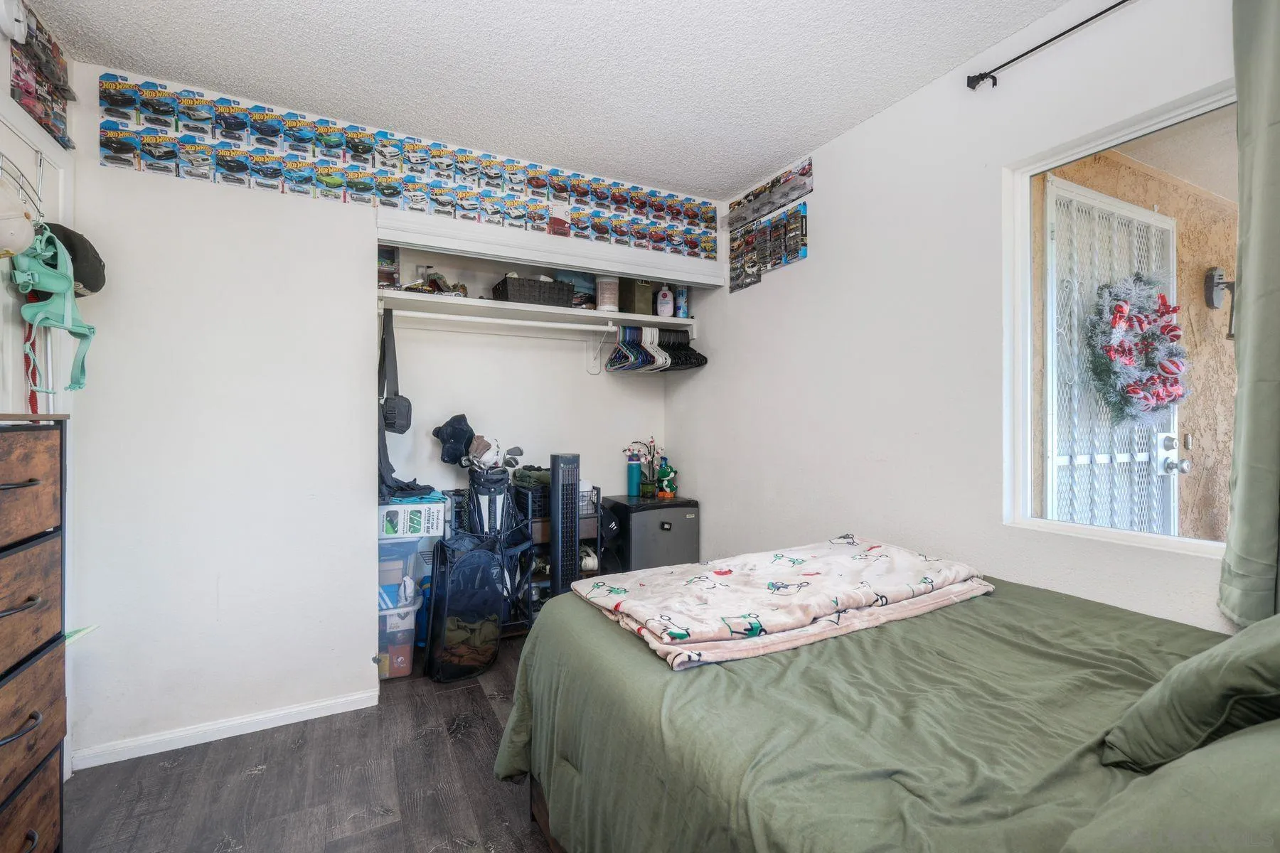 1302 Valencia Loop Chula Vista, CA 91910 - Photo 24 of 30 a bed sitting in a bedroom next to a window