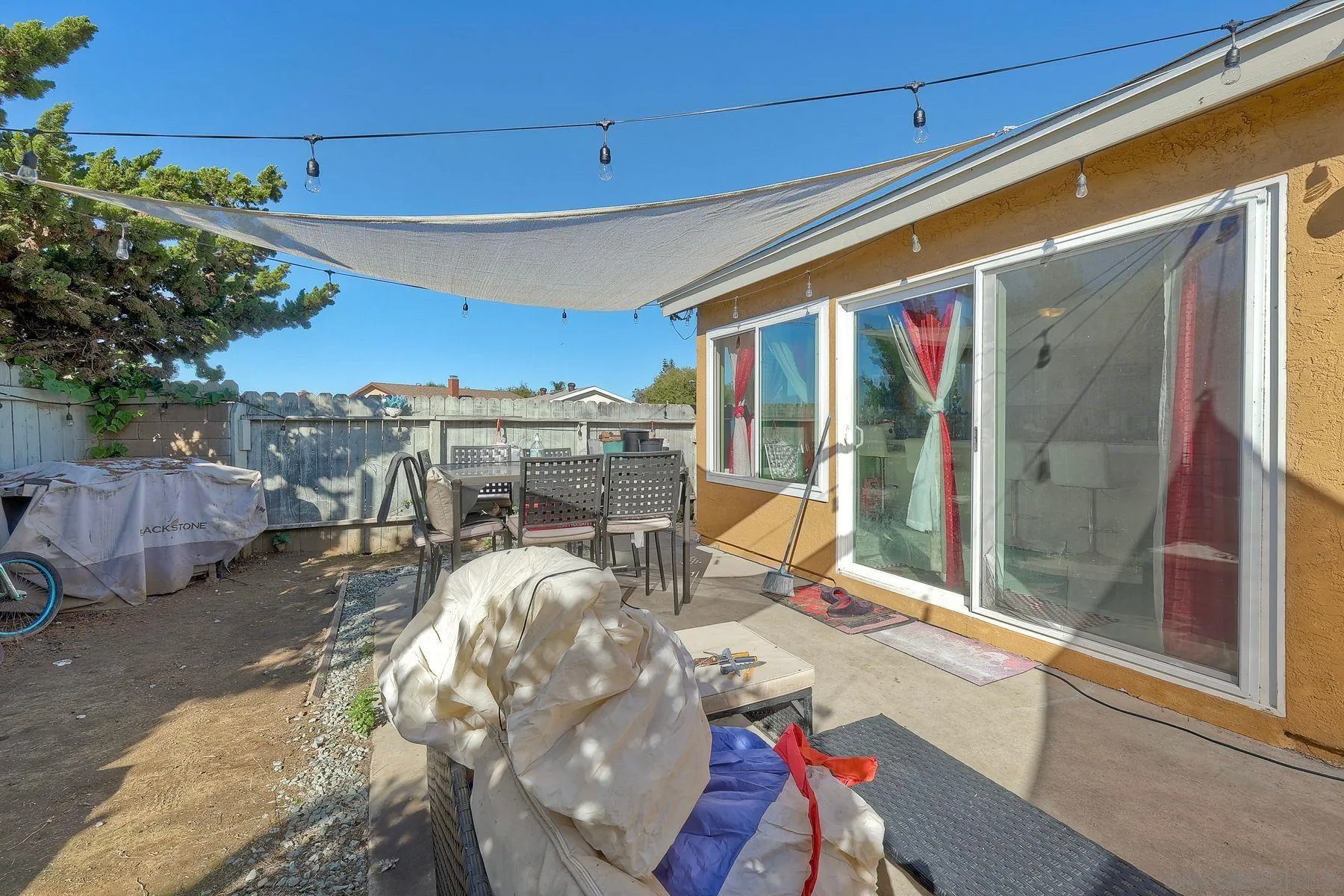 1302 Valencia Loop Chula Vista, CA 91910 - Photo 27 of 30 a view of a chairs and table in patio
