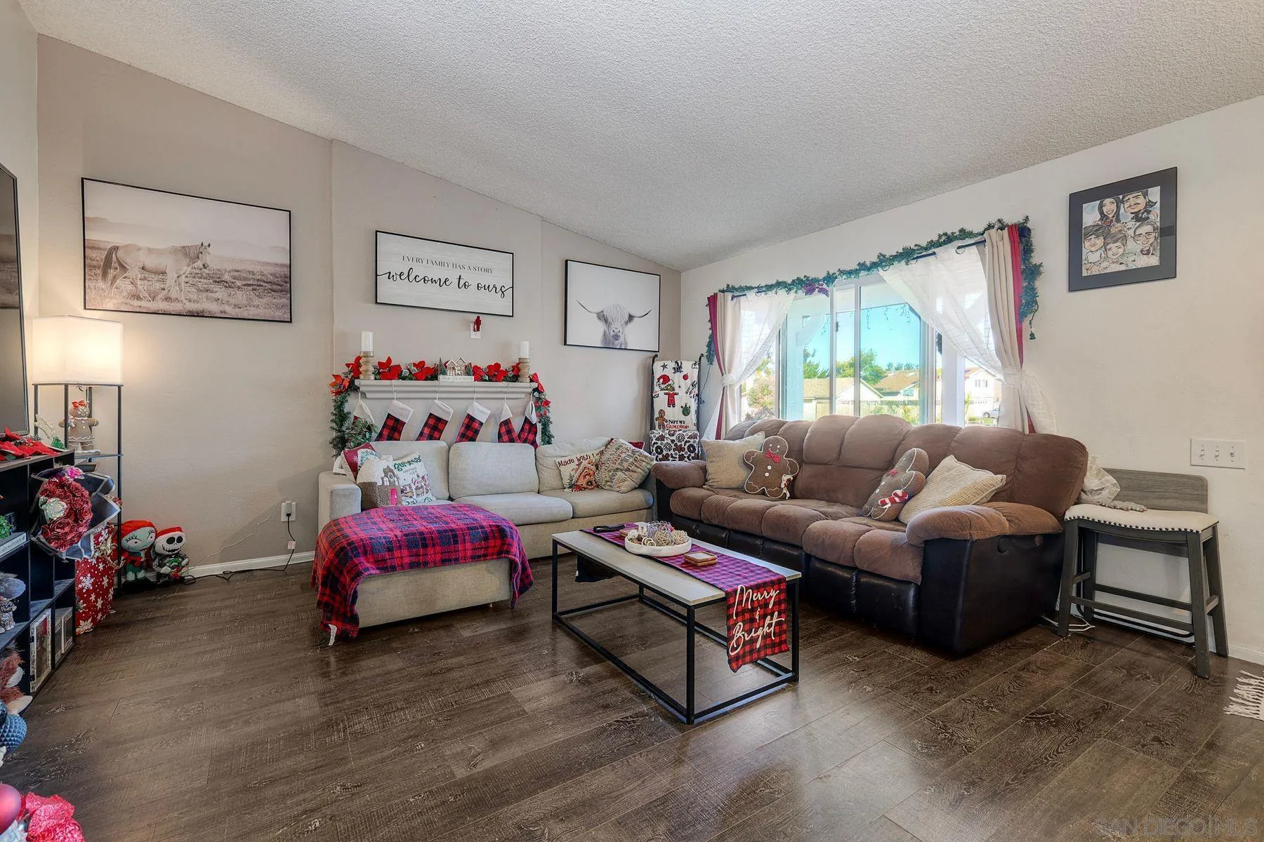 1302 Valencia Loop Chula Vista, CA 91910 - Photo 5 of 30 a living room with furniture and a window