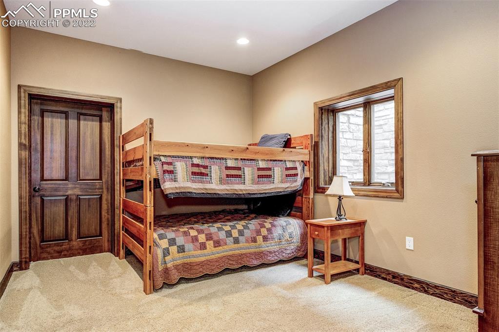 6453 Reno Road Pueblo, CO 81004 - Photo 28 of 36 a bed room with a bed and a window