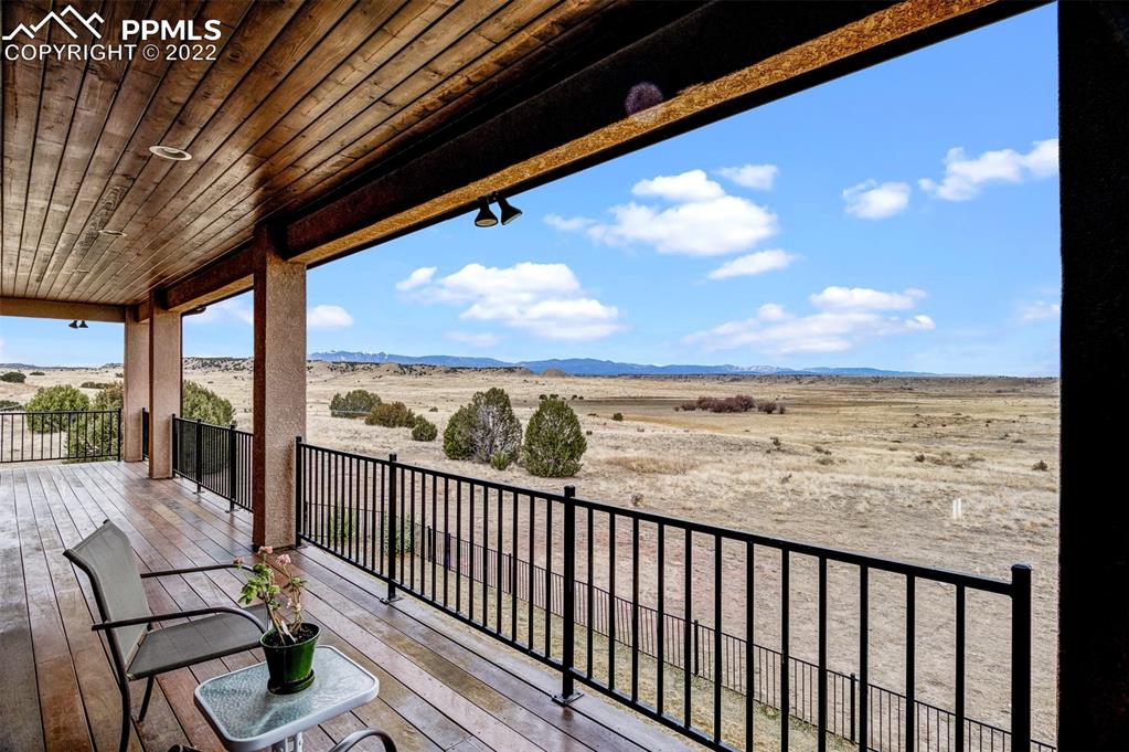 6453 Reno Road Pueblo, CO 81004 - Photo 34 of 36 a view of a chairs and table in the balcony
