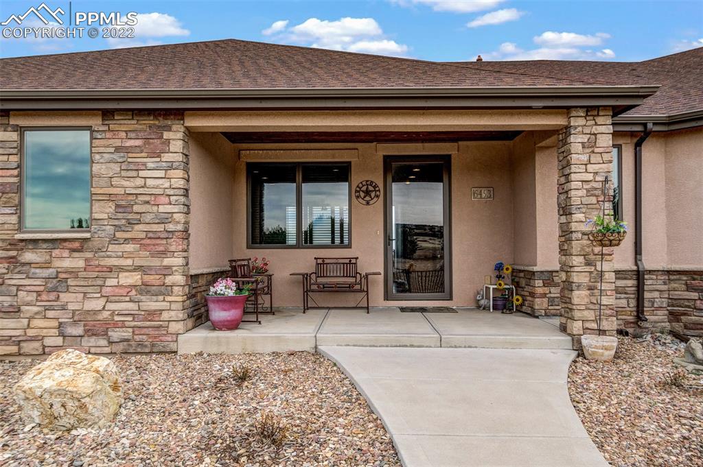 6453 Reno Road Pueblo, CO 81004 - Photo 10 of 36 a view of a entryway door of the house