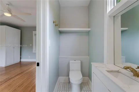 a bathroom with a sink and a toilet