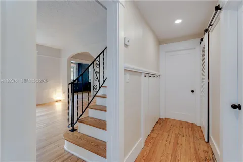 a view of entryway with wooden floor
