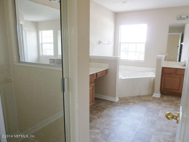 801 Crystal Spring Way St. Augustine, FL 32092 - Photo 7 of 15 a view of an empty room with a window
