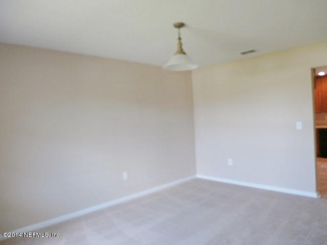 801 Crystal Spring Way St. Augustine, FL 32092 - Photo 8 of 15 a view of an empty room