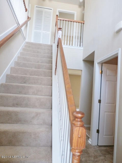 801 Crystal Spring Way St. Augustine, FL 32092 - Photo 9 of 15 a view of entryway and hall with wooden floor