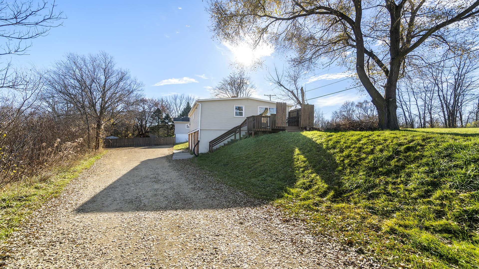 3702 Genoa Road Cherry Valley, IL 61016 - Photo 4 of 17 a view of a yard
