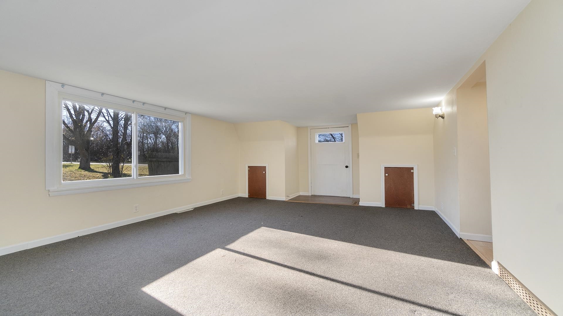 3702 Genoa Road Cherry Valley, IL 61016 - Photo 5 of 17 an empty room with windows and closet